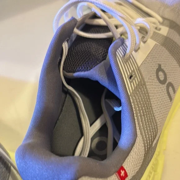 On Running Light Gray and Soft Yellow Shoes
